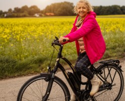 Smiling lady on an e-bike