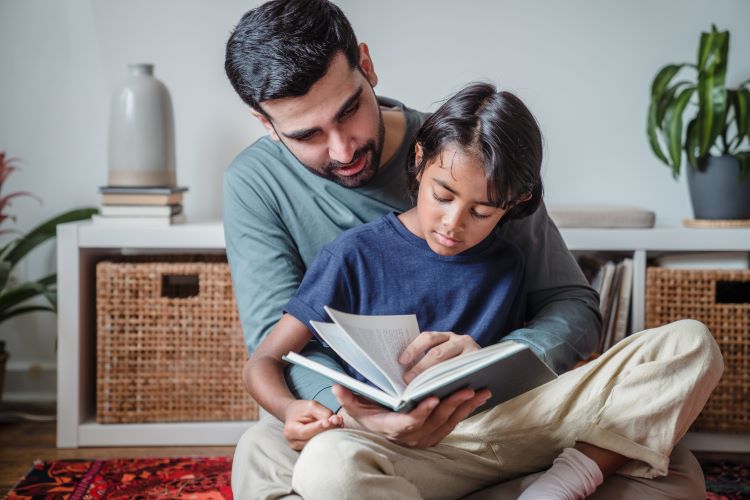 Man and child reading