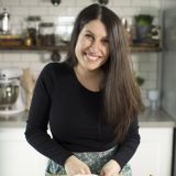 Portrait image of Tracy Michael cooking in a kitchen setting