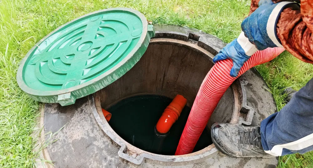 someone pumping out a septic tank