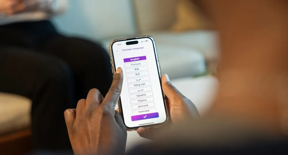 Woman on phone choosing language