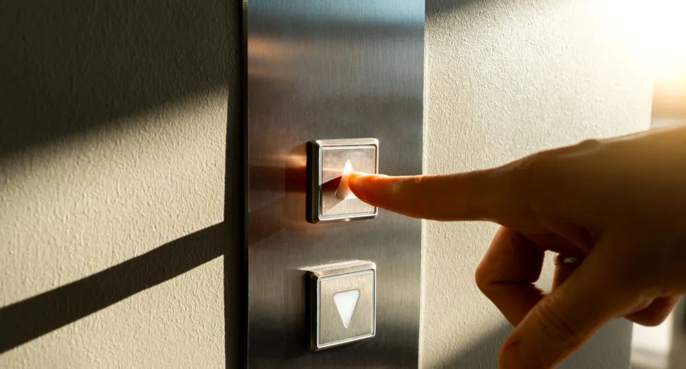 someone pushing a button for an elevator