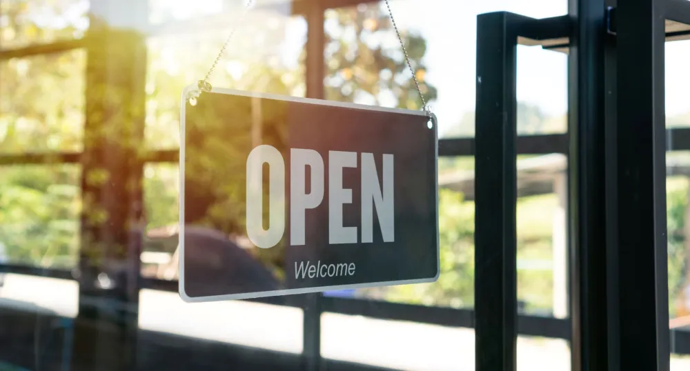 Open sign displayed in a window