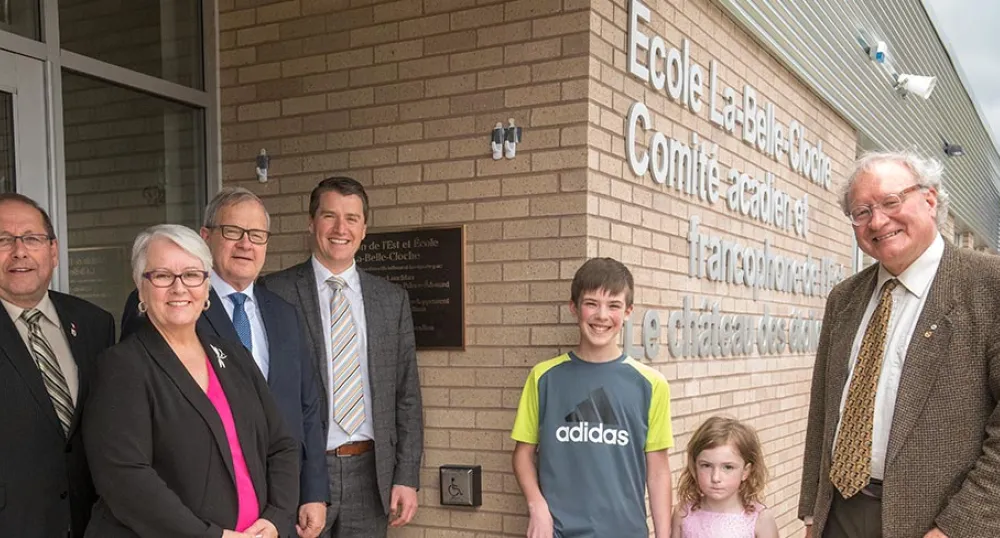 Minister Sonny Gallant, Minister Paula Biggar, Federal Minister Lawrence MacAulay,  Minister Jordan Brown, Premier Wade MacLauchlan with students.