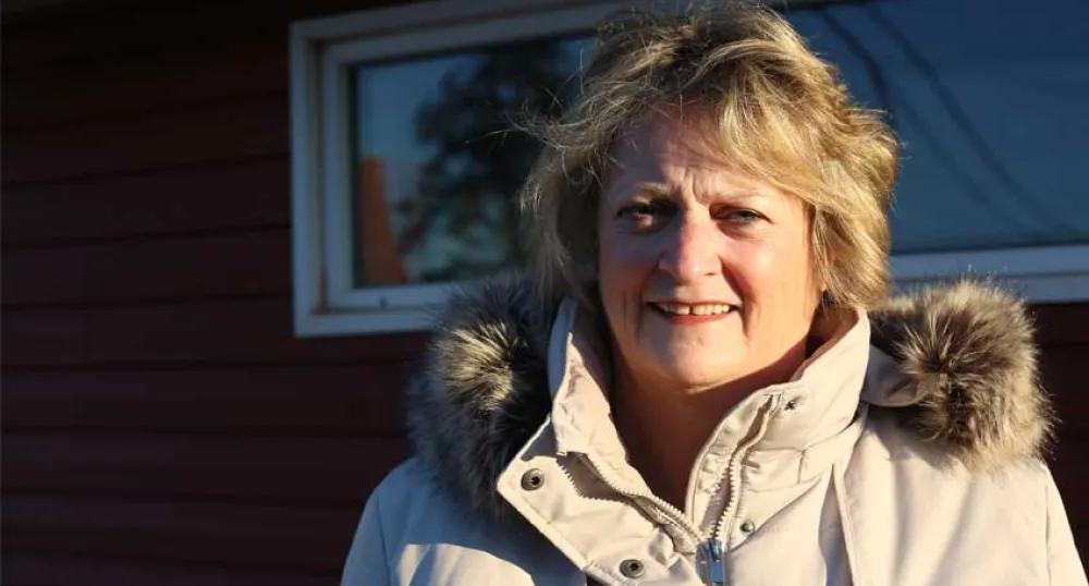 This photo shows cancer survivor Donna Gallant, standing outside in winter. 