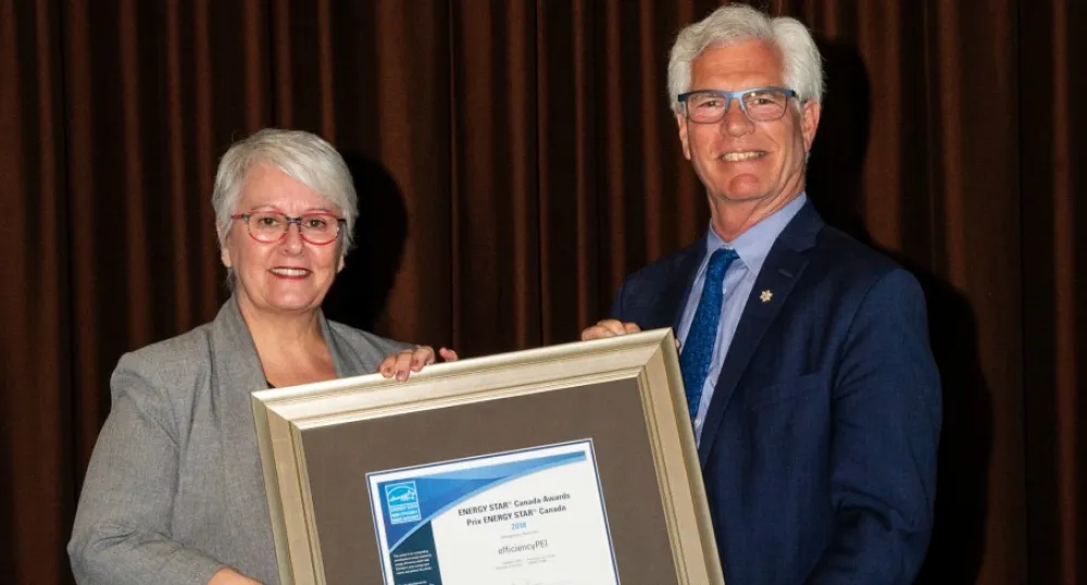 Paula Biggar, Minister of Transportation, Infrastructure and Energy and Jim Carr, Federal Minister of Natural Resources.