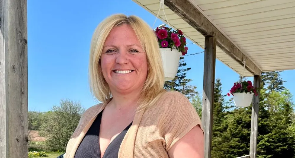 image of a person standing on an outdoor veranda