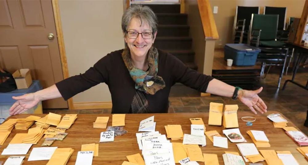 Irene Novaczek with some of the seeds available at Seedy Saturday.