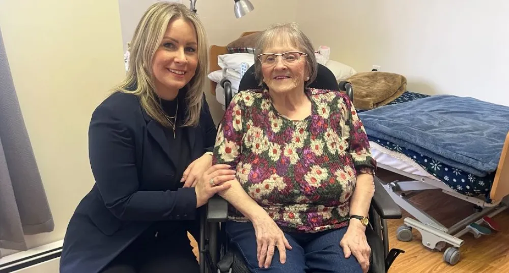 Samantha Gaudet and Edna MacInnis smile beside eachother
