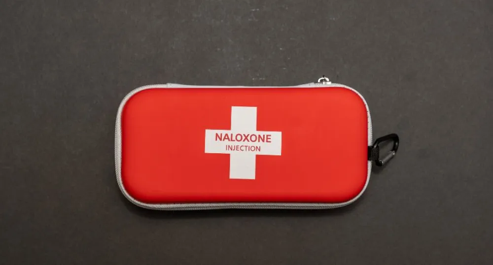 image of a red naloxone kit