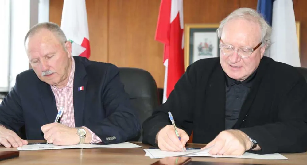 Guy LaBonté, Chair of the Société Saint-Thomas-d'Aquin and Premier Wade MacLauchlan