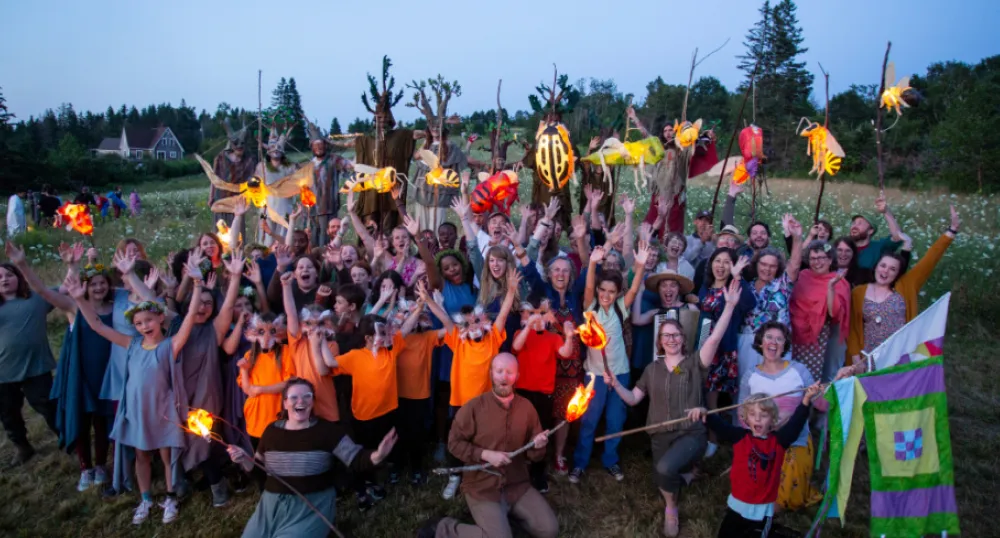 image of a group of people in theatrical costumes in a field