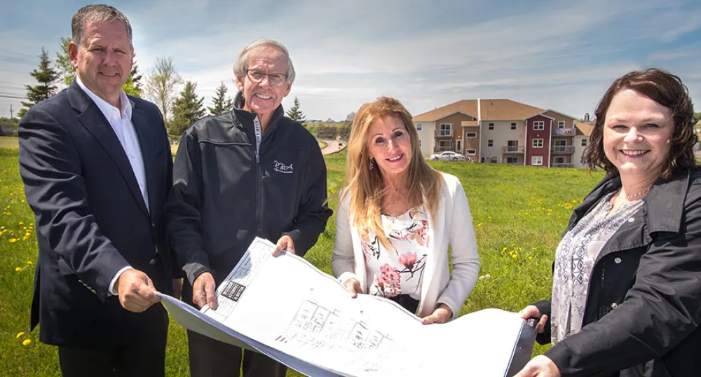 Steven Birt, Roger Birt, Minister Tina Mundy and Lori Birt