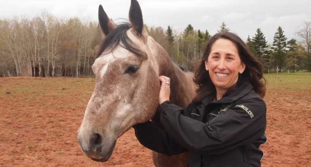 Caroline LebLanc with therapy horse Diesel