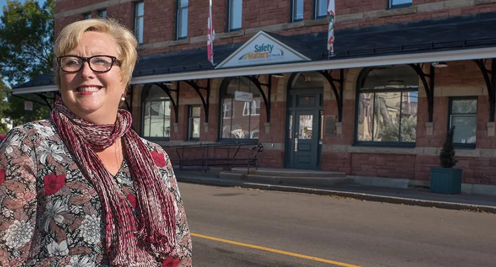 Lawyer Susan Robinson stands in front of the Workers Compensation Board offices.