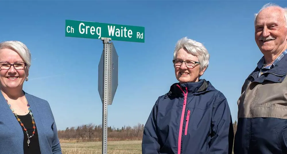Minister Paula Bigger, Miriam Waite, wife of Greg Waite, David Linkletter, chair of the community council