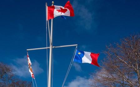 Flag Protocol PEI Image of PEI flag, Canada flag and Acadian flag at Government House