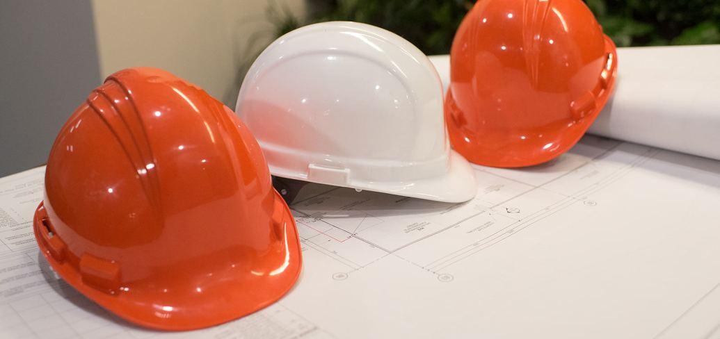 Hard hats and design plans