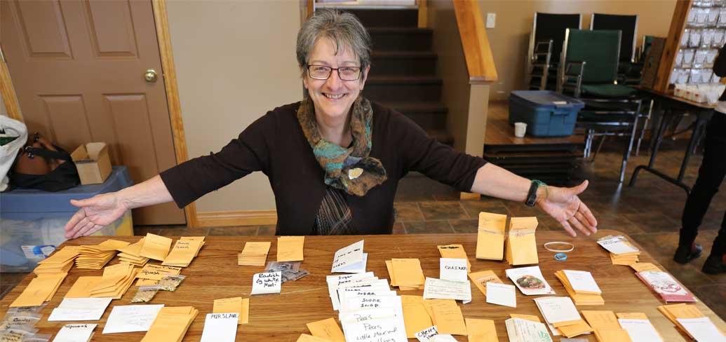 Irene Novaczek with some of the seeds available at Seedy Saturday.
