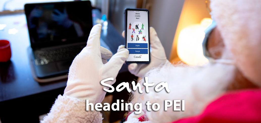 Image of Santa holding a cell phone with words on it