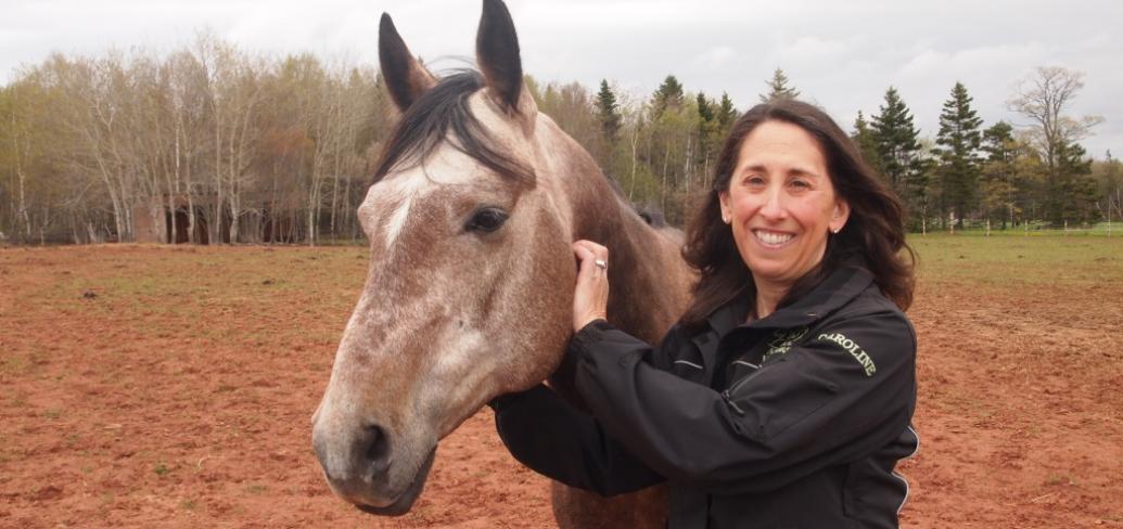 Caroline LebLanc with therapy horse Diesel
