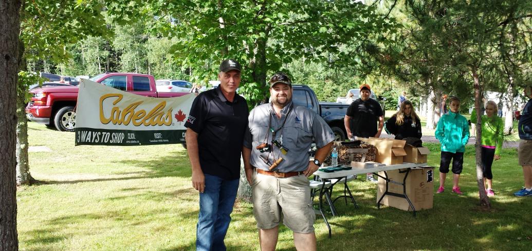 Minister of Communities, Land and Environment Robert Mitchell speaks with Eric Paynter of the Delta Waterfowl Chapter at Saturday’s Youth Waterfowl Day.