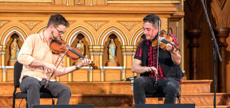 Musicians playing inside Historic St. Mary's Church as par of the PEI Festival of Small Halls