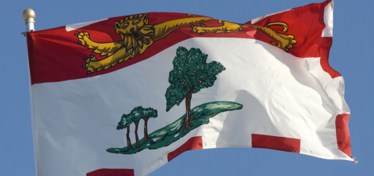 Prince Edward Island flag against a clear blue sky