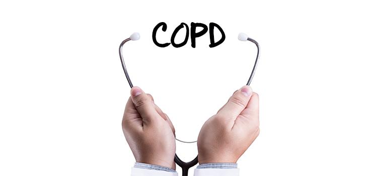 Stethoscope wrapped around the letters COPD (Chronic Obstructive Pulmonary Disease)