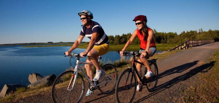 Couple biking on Confederation Trail