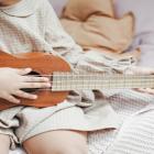 child playing the guitar