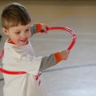 Boy playing with a hula hoop