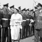 Queen Elizabeth II inspecting a lineup of military personnel at the Charlottetown waterfront during the Royal Visit to Prince Edward Island in 1959.