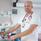 Andrew Fudge, RN at work in a clinical setting