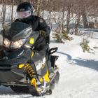 PEI’s Conservation Officers patrolling on snowmobiles. 
