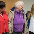 Photos shows Minister Tina Mundy standing with four senior ladies.