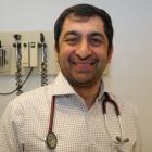 Dr. Naser in clinical setting at Prince County Hospital