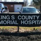 The photo shows the sign for the Kings County Memorial Hospital. 