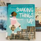 A library display of books featuring strong women