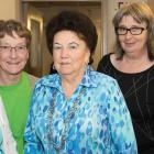 Four senior women standing beside Minister Mundy.