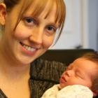 Photo shows new mom Sara McKenna and her baby Emma