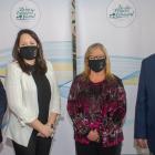 Standing in a row, wearing facemasks: PEI Minister James Aylward, Stratford Town Councilors Jill Burridge and Gail MacDonald, and Federal Minister Lawrence MacAulay