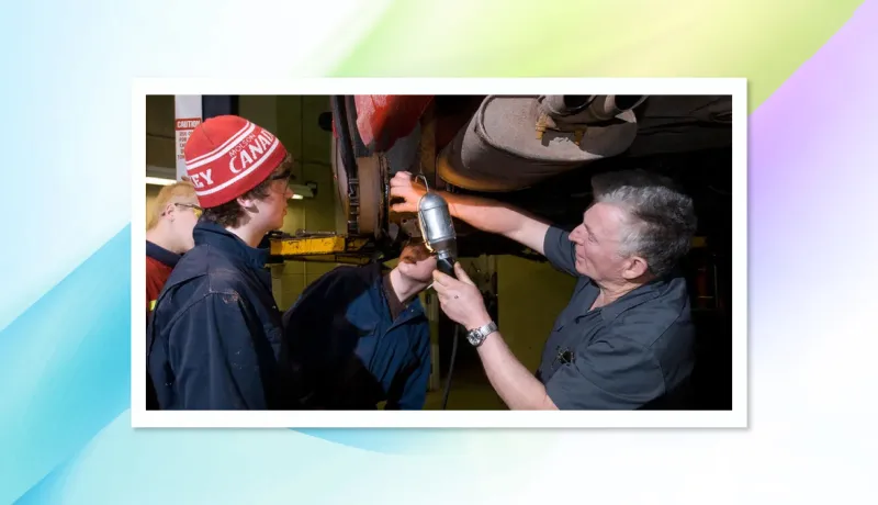 Apprentices learning about auto mechanics