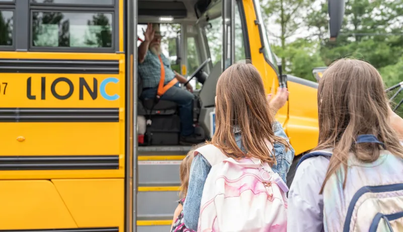 Children waiting for the school bus.