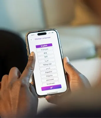 Woman on phone choosing language
