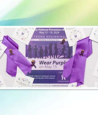image of a small poster surrounded by purple ribbons and pins