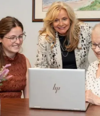 Minister of Social Development and Seniors Barb Ramsay joins Session Coordinator Sydney Wheatley and Audrey Morris ahead of the TechNTalk series being offered to older Islanders this summer