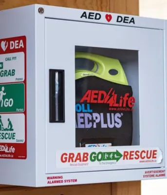 An Automated External Defibrillator (AED) on a wall.