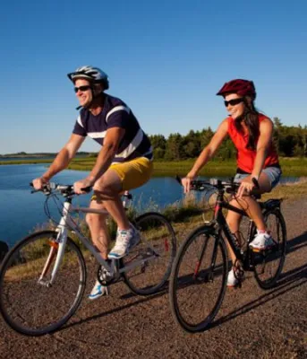 Couple biking on Confederation Trail