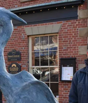 Ahmon Katz with his sculpture of a Blue Heron in Charlottetown